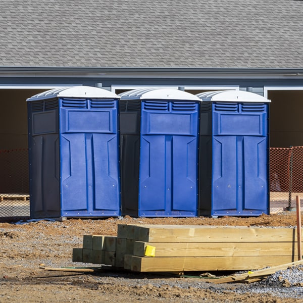 what is the cost difference between standard and deluxe portable toilet rentals in Oakwood TX